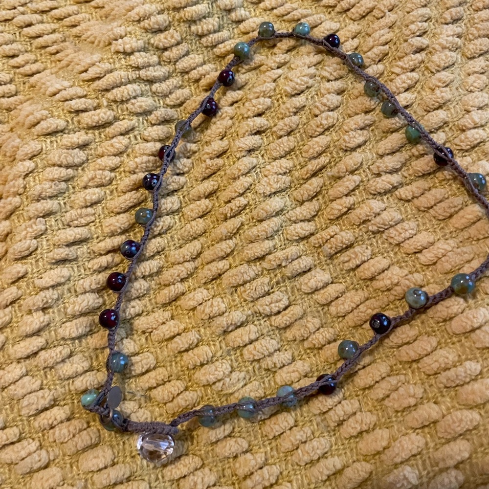 On U beaded necklace